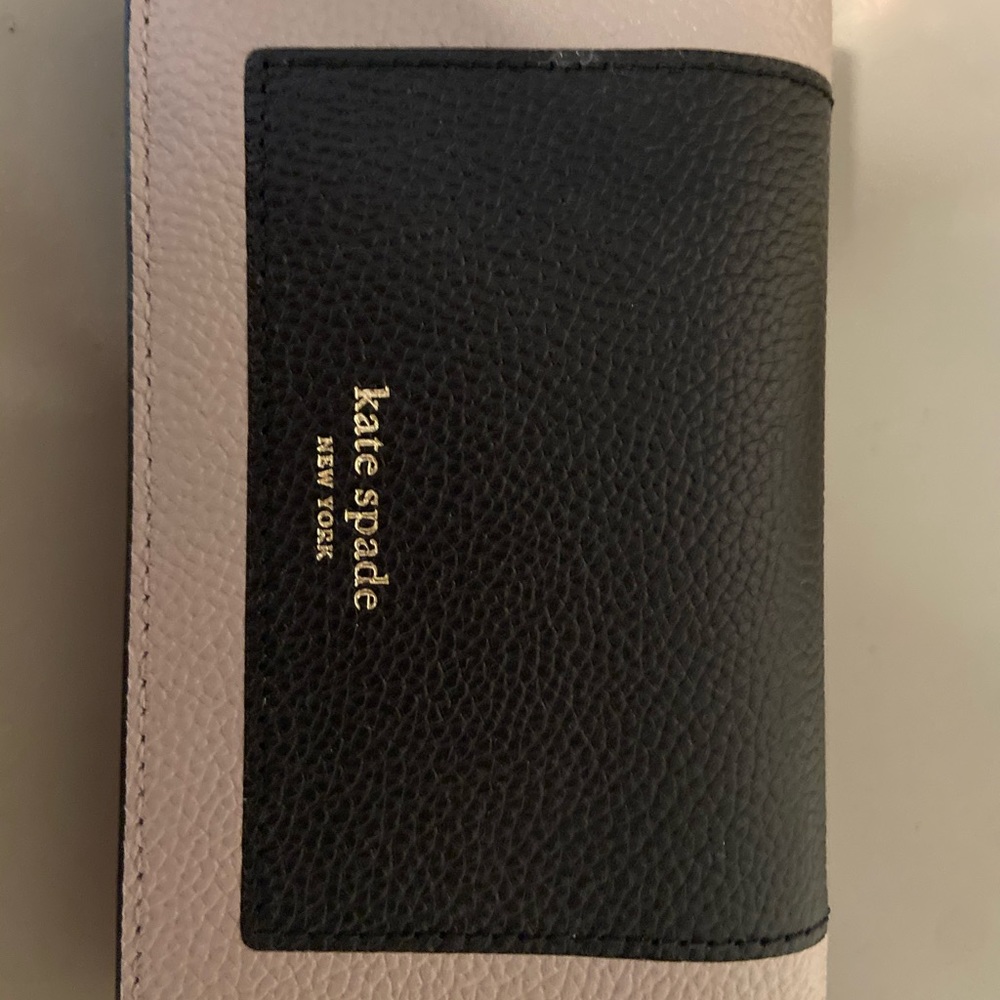 Kate space wallet never used! Perfect condition